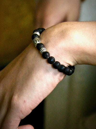 Bracelet - Natural Black Vesuvianite Beads With A Budda Face Bracelet